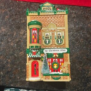 Department 56 “The Christmas Shop”. This is a retired building.